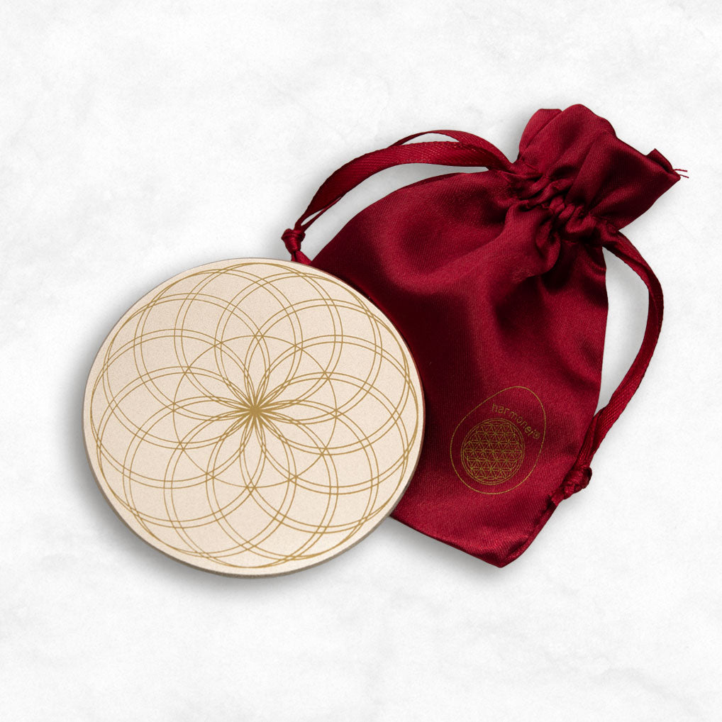 Die Untersetzer TOWER® schmückt die Blume des Lebens.