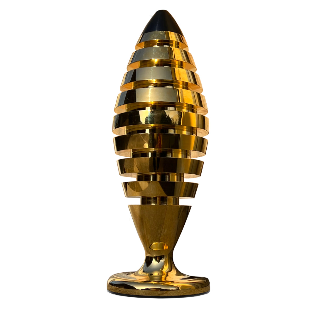 The Tower® aus Aluminum mit 24 Karat gold in 52 cm, ist mit verschiedenen Halbedelsteinen gefüllt und sorgt für ein gesundes Raumklima. Nur bei ch.ambition.life online kaufen.